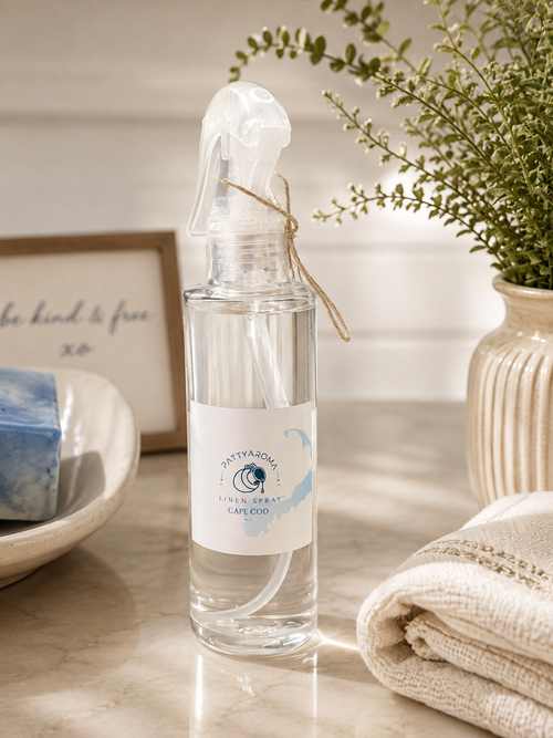 PattyAroma Cape Cod Linen Spray in an amber bottle