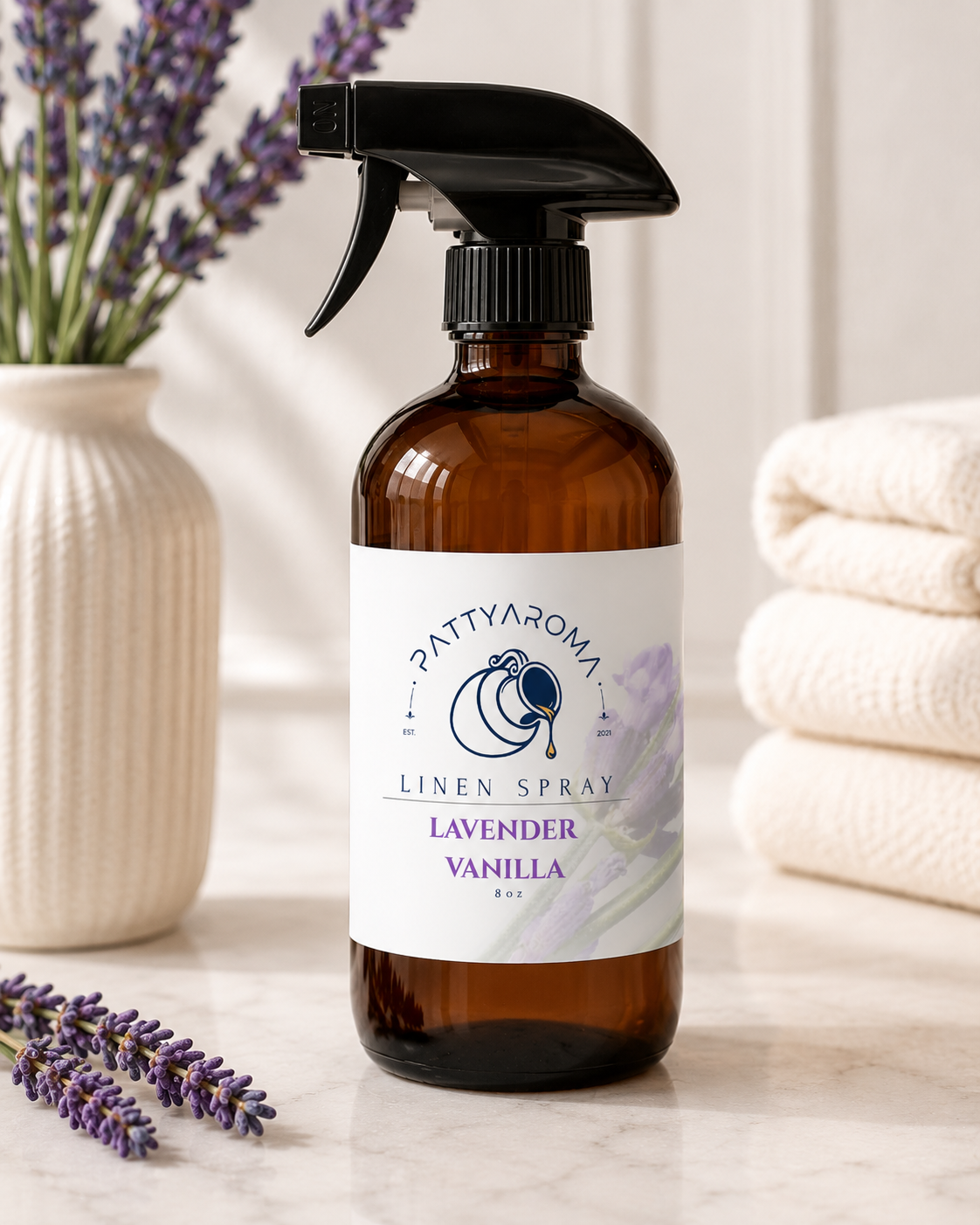 PattyAroma Lavender Vanilla Linen Spray in an amber bottle